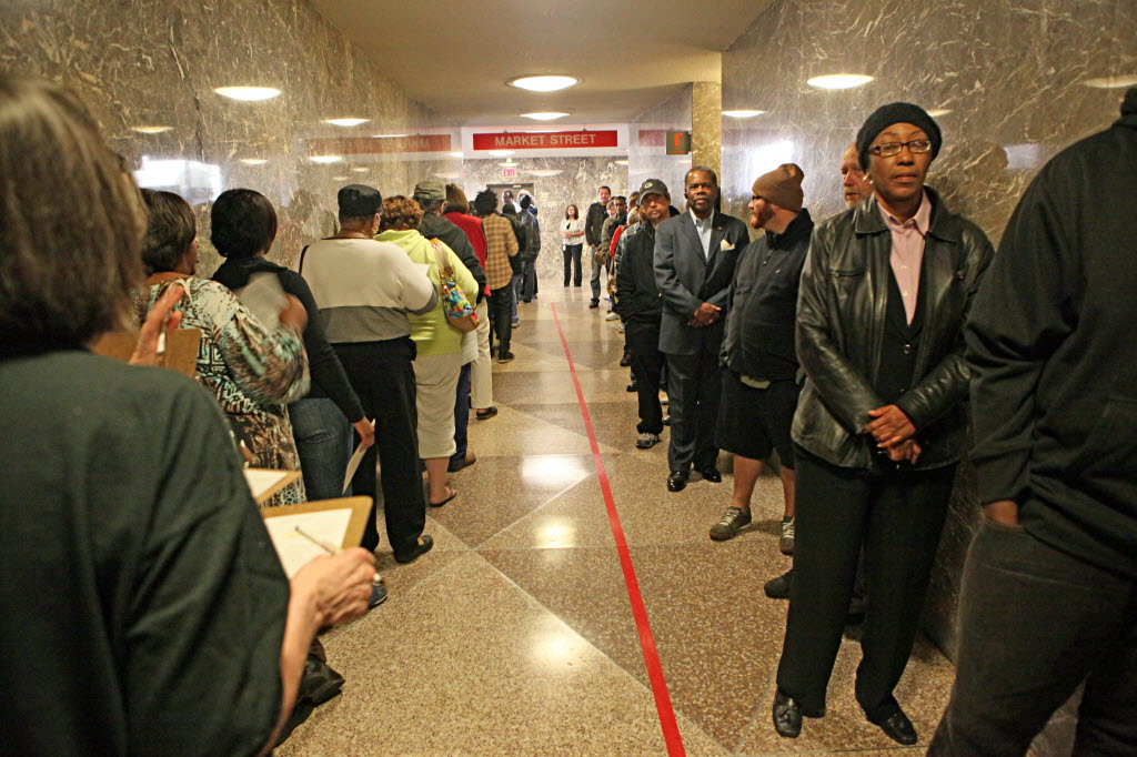 People line up for early voting in the 2012 presidential election. They waited at the Zeidler Municipal Building in Milwaukee. JS photo/Michael Sears
