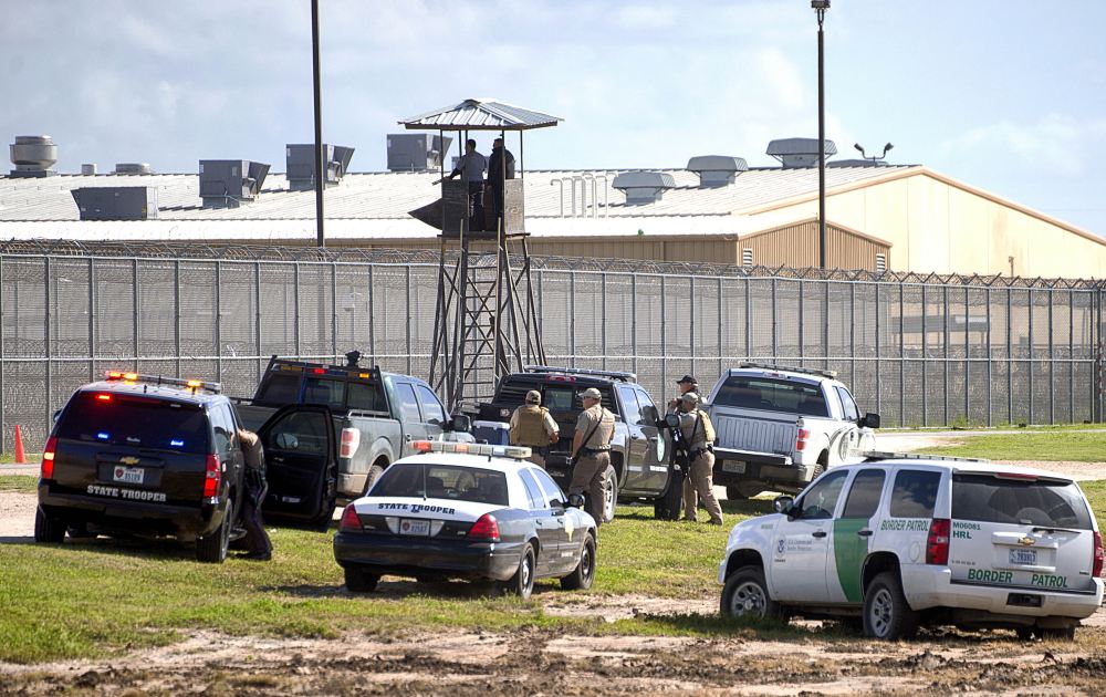In 2015, law enforcement officials converged on the Willacy County Correctional Center in Raymondville, Texas in response to an uprising at the private immigration detention center. The facility is now closed. (2015 AP file photo)