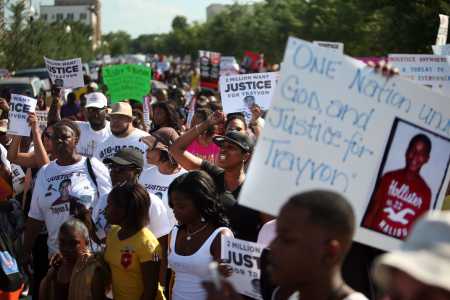 A crowd rallies outside a city commission meeting in Sanford. Photo by Kathleen Flynn/Tampa Bay Times.