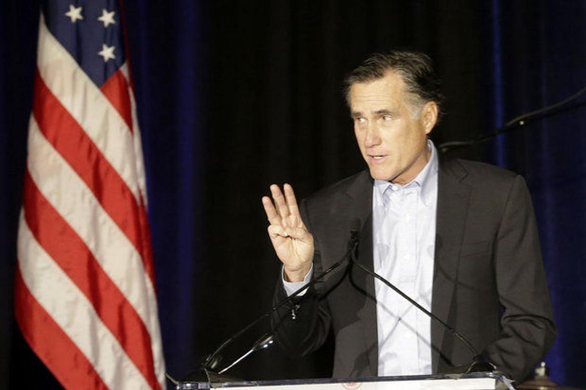 Mitt Romney deepened speculation about a possible third run for the presidency in a winter meeting of the Republican National Committee in San Diego on Jan. 16. AP photo.