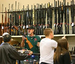 Customers line up to buy guns at Adventure Outdoors in Smyrna, Ga. on Jan. 7, 2013. Gun sales were brisk and the store was selling out of ammunition on a daily basis.