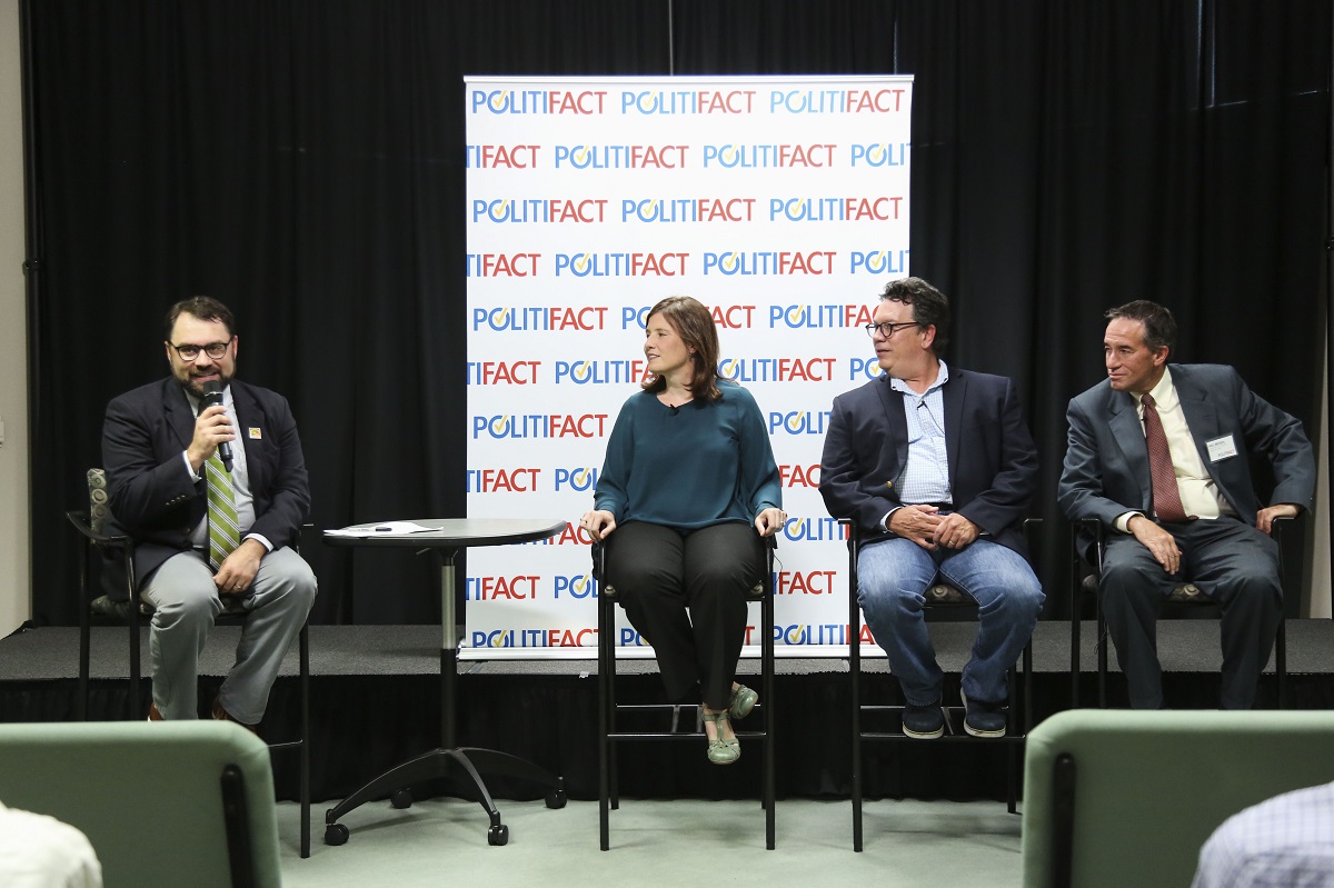 (from left to right) Aaron Sharockman, Politifact Executive Director introduces a panel featuring Angie Holan, Politifact Editor, PolitiFact founder Bill Adair and Tampa Bay Times Editor Neil Brown at the Poynter Institute on August 22, 2017. (Times)