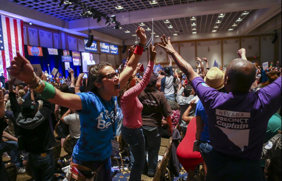 Supporters of Democratic presidential candidate Bernie Sanders react during the Nevada Democratic Party’s 2016 State Convention Las Vegas May 14. (Chase Stevens/Las Vegas Review-Journal via AP)