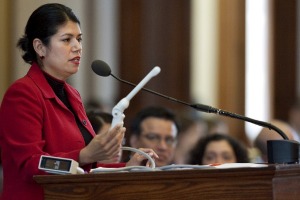 State Rep. Carol Alvarado holds a vaginal probe on the Texas House floor March 2.
