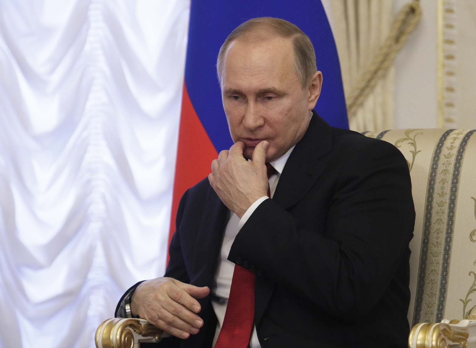 Russian President Vladimir Putin gestures during a meeting with Belarus' president in St.Petersburg, Russia, April 3, 2017. (AP Photo/Dmitri Lovetsky)
