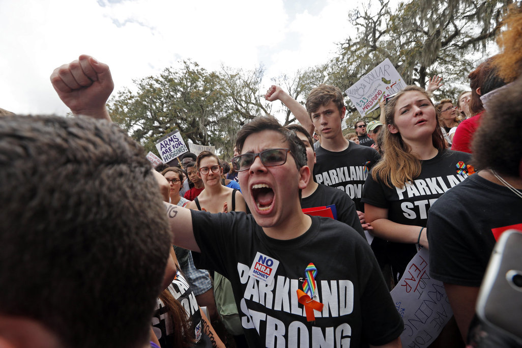 Student survivors from Marjory Stoneman Douglas High School participate in a rally for gun control reform on the steps of the state capitol, in Tallahassee, Fla., Wednesday, Feb. 21, 2018. (AP Photo/Gerald Herbert)