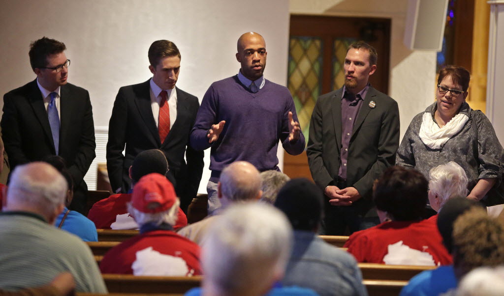 State Rep. Mandela Barnes, D-Milwaukee, talks about the legislative efforts on various issues important to the faith community, following a march to the Capitol for a lobbying day.