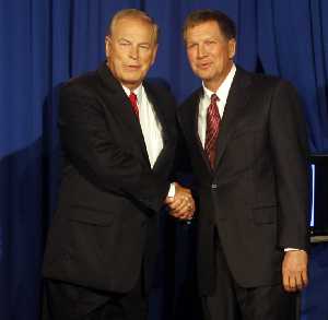 Ohio Gov. Ted Strickland, left, and Republican challenger John Kasich were all smiles before their debate Sept. 14, but each has taken whacks at the other during the campaign.