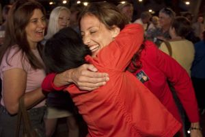 Austin City Council candidate Kathie Tovo, right, hugs council member Sheryl Cole at Tovo's election results party on May 14. She's headed into a June 18 runoff race against incumbent Randi Shade.