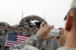 U.S. Army soldiers pose for a photo after crossing the border from Iraq into Kuwait on Aug. 16.