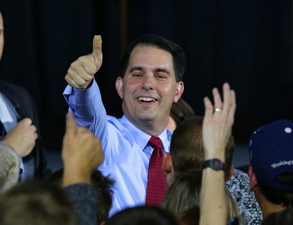 Governor Scott Walker thanks supporters as he wins another term over challenger Mary Burke during his election night rally at the Wisconsin State Fair Park Exposition Center in West Allis, November 4, 2014. Milwaukee Journal Sentinel photo by Rick Wood