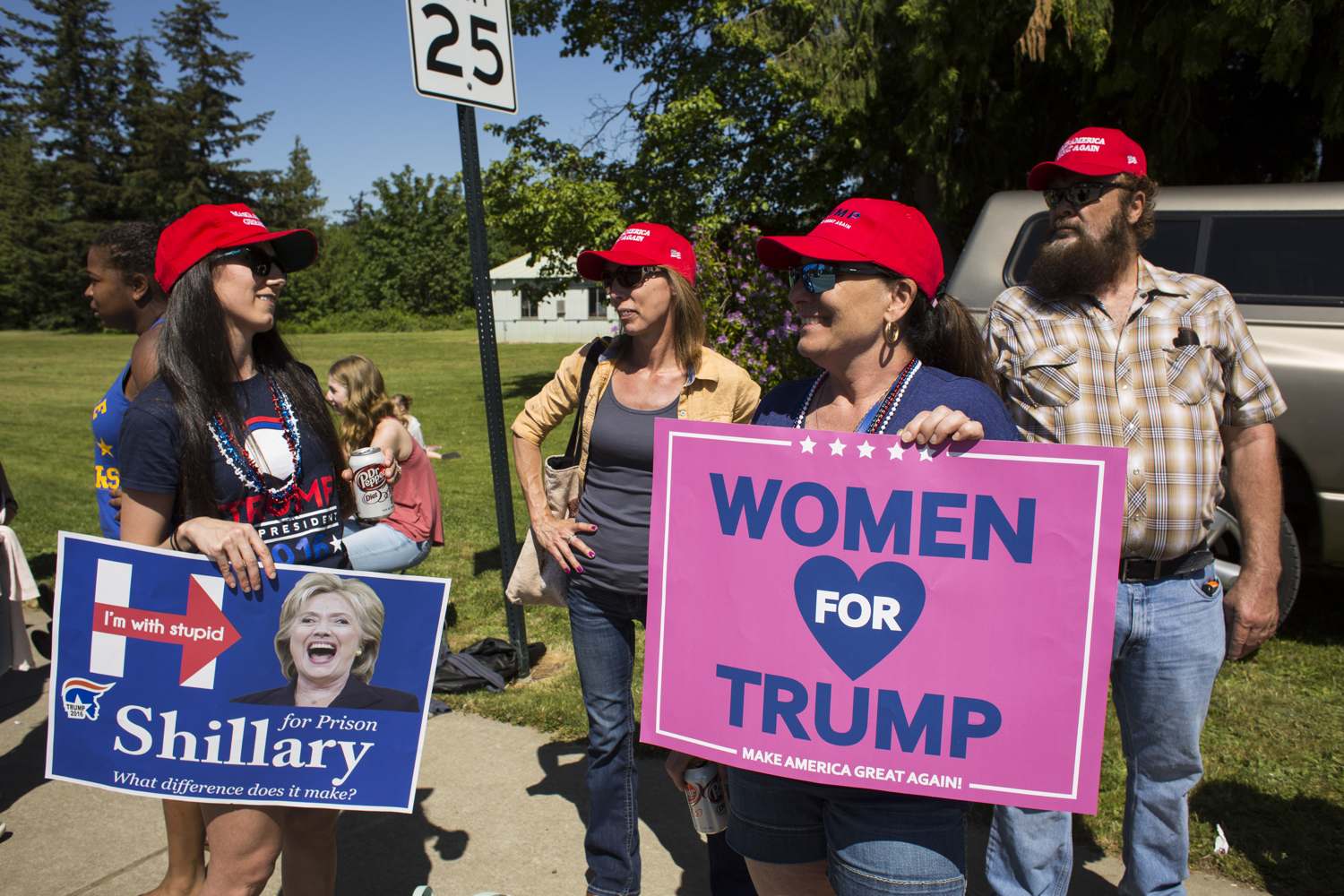 Supporters hold signs hours before a Donald Trump rally in Lynden, Wash., May 7, 2016. (David Ryder/The New York Times)