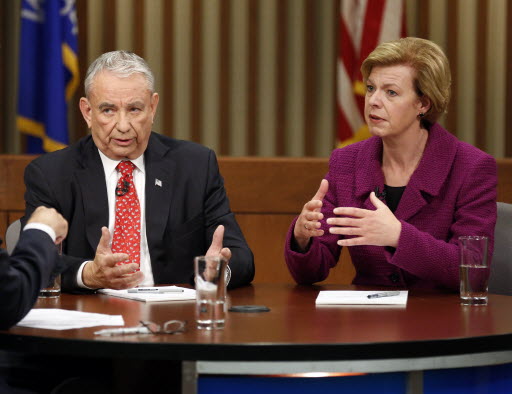 Tommy Thompson and Tammy Baldwin exchanged remarks in the final US Senate debate, on Oct. 26, 2012